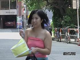 Perfect Japanese sweetie walking down her street during sharking scene