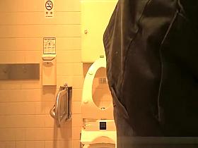 Asian woman spied in toilet peeing