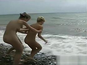 3 Les girls on a nude beach