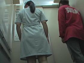 Man in the lift pulls nurse skirt up and shows her booty