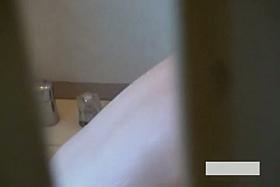 Amateur asian brunette on hidden bath cam