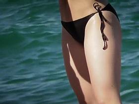 Hot teen girl having fun on the beach