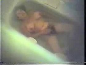 My hairy mum caught masturbating in bath tube. Hidden cam