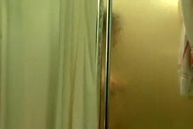 Wife secretly filmed showering