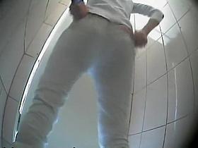 Tight teenage ass spied at a toilet
