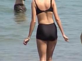 Black bikini candid voyeur girl on the crowded beach 07a
