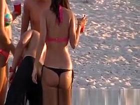 A Hot Chick in a Thong on the Beach
