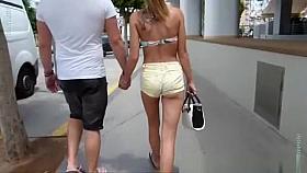 Girl in a sexy shorts to walk around the city
