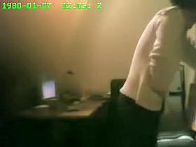 Raunchy security cam masturbation from the office cutie