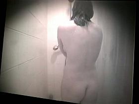 Busty dorm coed showing hairy pussy and tits in shower