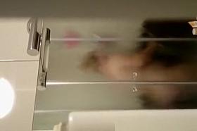 Husband secretly films wife taking shower