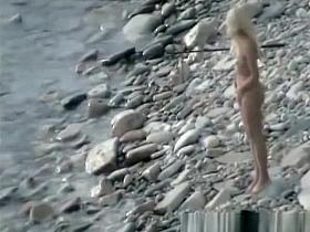 Nudist fucked hard on rocky beach