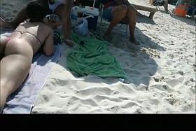 Hot asses in small bikinis in the beach