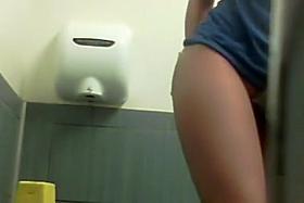 Attractive girls peeing and shitting in the college toilet