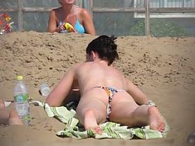 Topless beach brunette part1