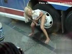 Blonde girl makes a big puddle in public