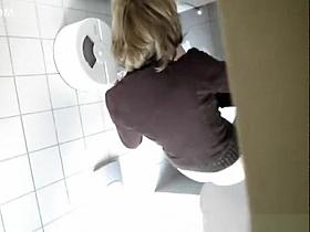 Woman caught in public toilet peeing