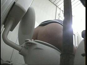Spy toilet camera catches a sexy mature woman's pussy peeing