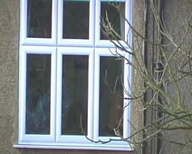 neighbour opening curtains