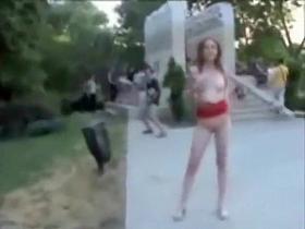 Hot nude model in a public park