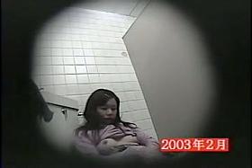 A hot horny girl masturbating in toilet