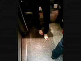 Feet in a metro train V