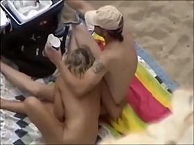 Hot blonde girl rides a dick on the beach
