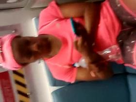 Ebony chick nice legs on the train