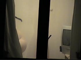 Window voyeur movie with girl in towel and naked