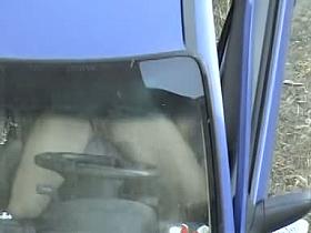 Amateur voyeur films a hot couple fucking in a car.