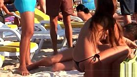 Young topless teens on the beach showing natural firm boobs in public!