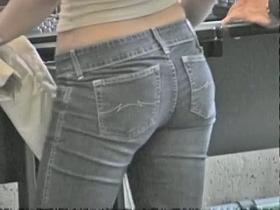Tight ass in jeans woman showing her curves for the voyeur camera