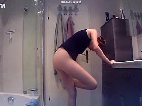Chick undressing her clothes in bathroom