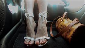 sexy feet & high heels in car