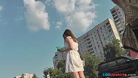 Skinny ass of young gal presented in oops upskirt act