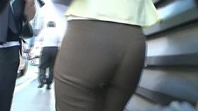 Milf secretary in office-style pants becomes the street candid