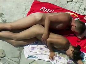 Couple making love at a beach