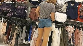 Sexy fit girl shops for clothes