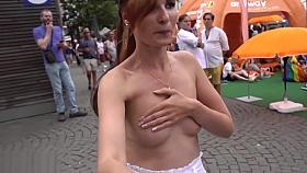 Jeny Smith flashing her perfect tits to strangers on the street while taking a selfie.