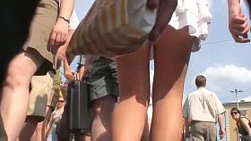 Voyeur cam takes a peek under a skirt of a blonde hottie