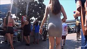 Ass of a woman pushing the cart