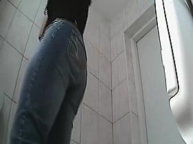 Arousing bent over view while she pees