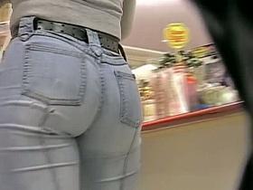 Candid street booty in tight denim jeans caught on tape.
