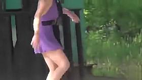 Drunk village chick enjoys doing cartwheels in a short summer dress