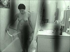 Hidden brunette in shower
