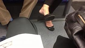 Candid mature Shoeplay Feet Dangling Flats on Train
