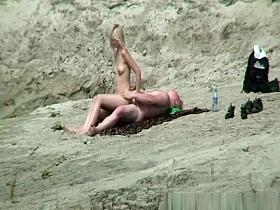 Nude couple fucking in the rocks