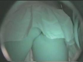A white chick with a nice big but in windy upskirt porno vid