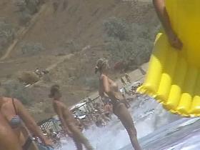 Real beach voyeur video of hot nudist chicks showing off their bodies by the water