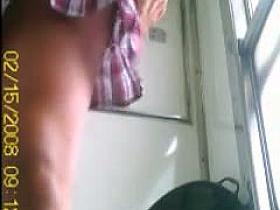 A hot chick pissing on a train